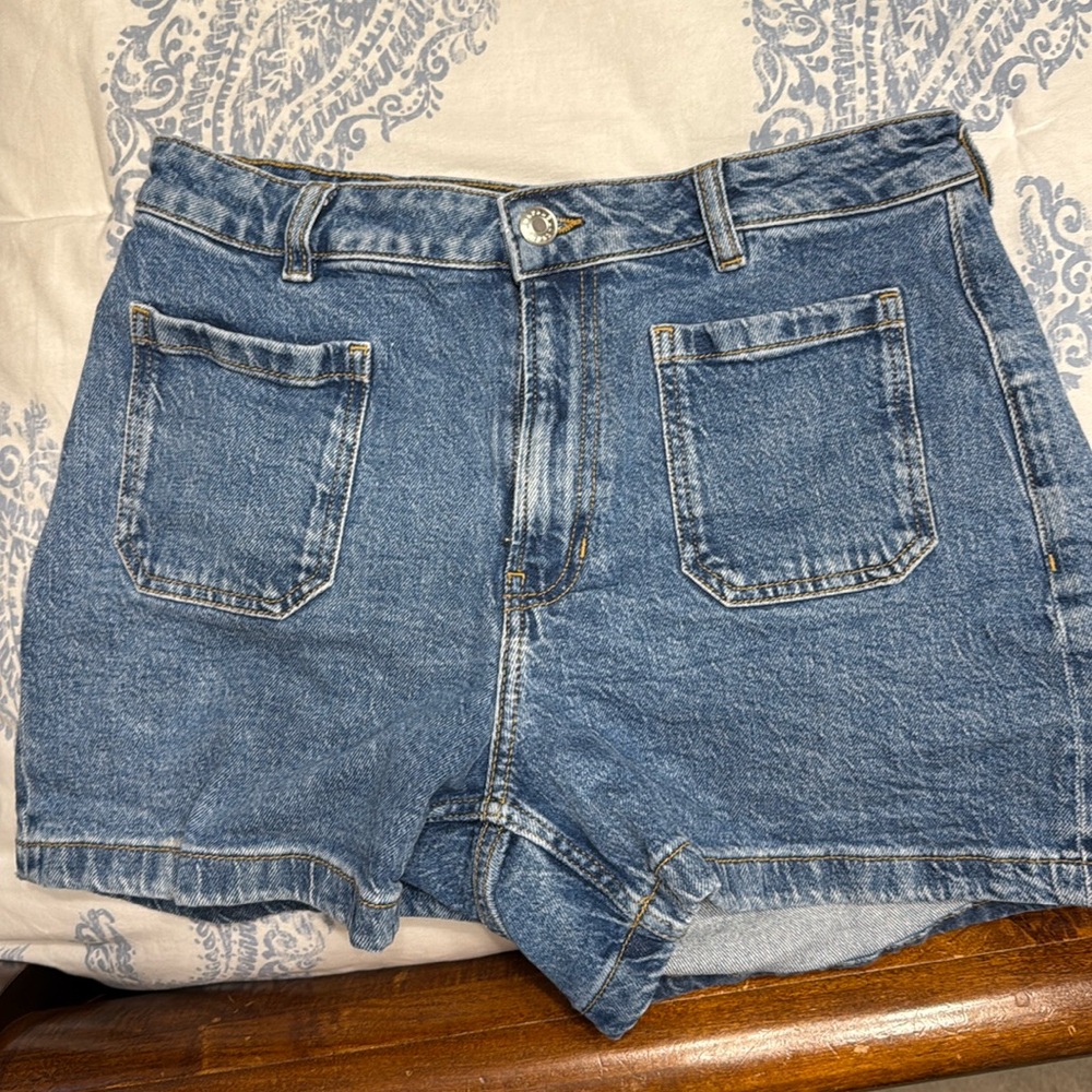 Jean shorts, patch pockets.